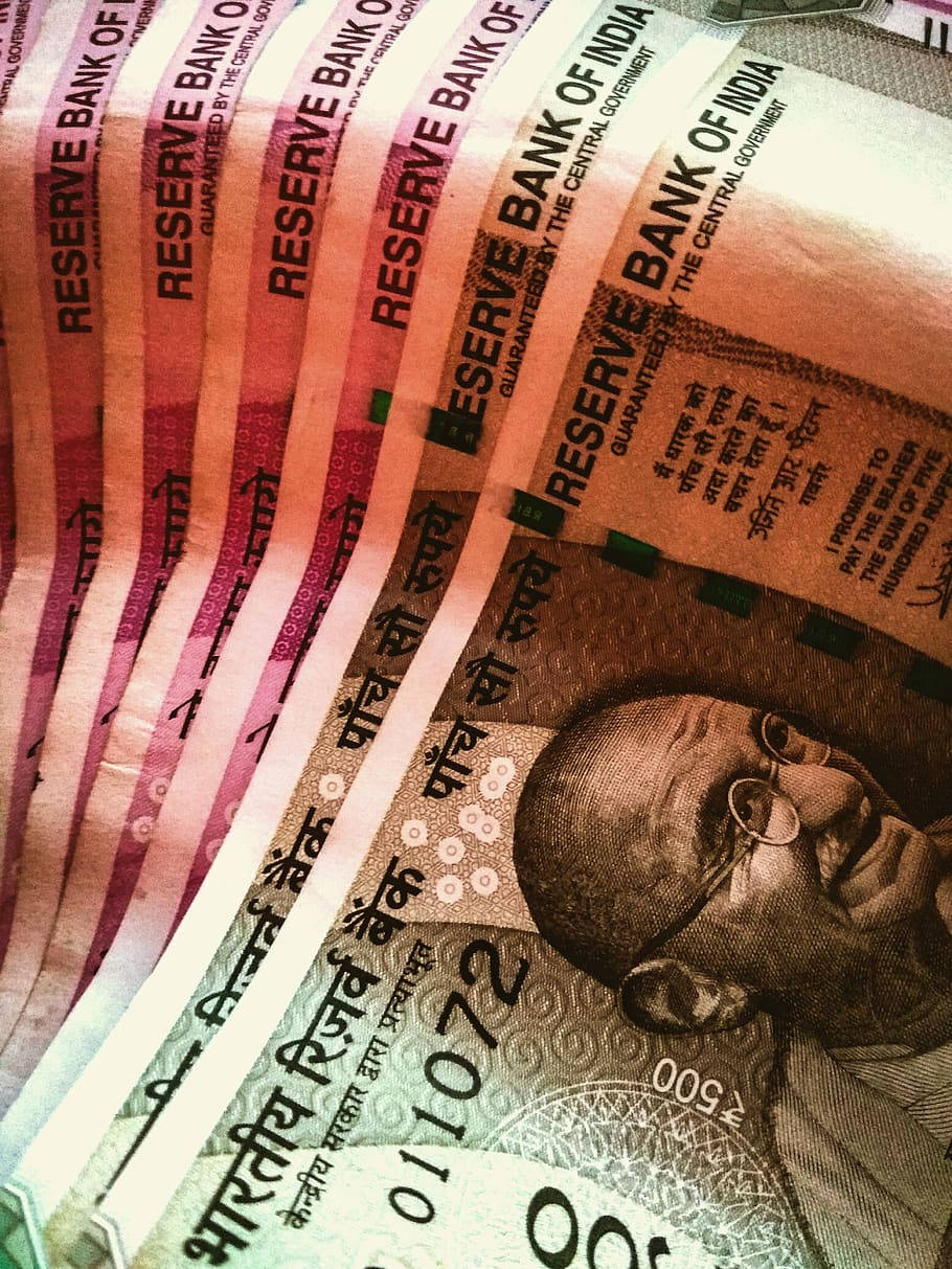 Indian 桌布 壁紙 — 印度盧比紙幣特寫，呈扇形展開，顯示聖雄甘地肖像及印度儲備銀行文字。