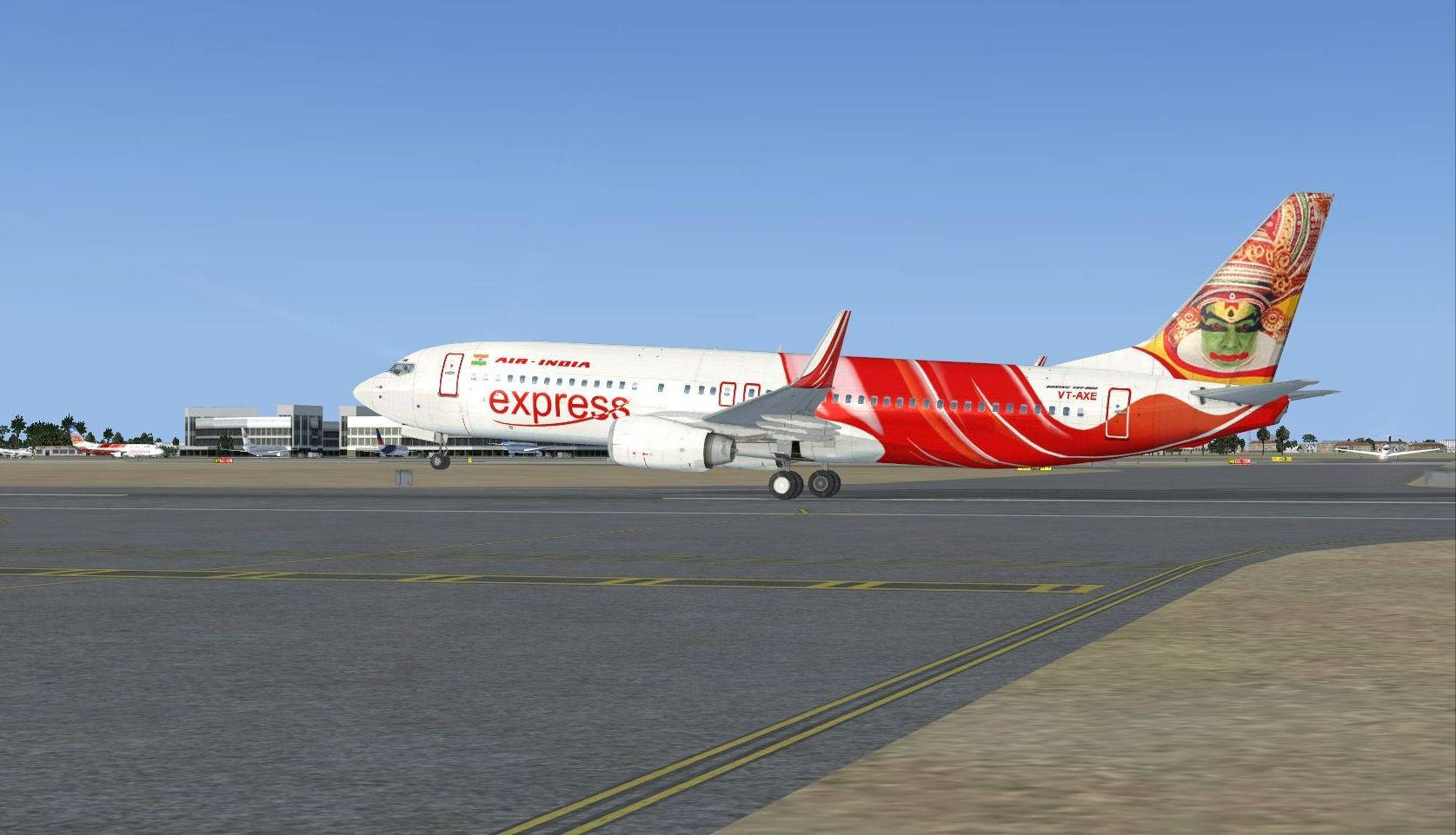 印度航空快運飛機在藍天下的機場跑道上