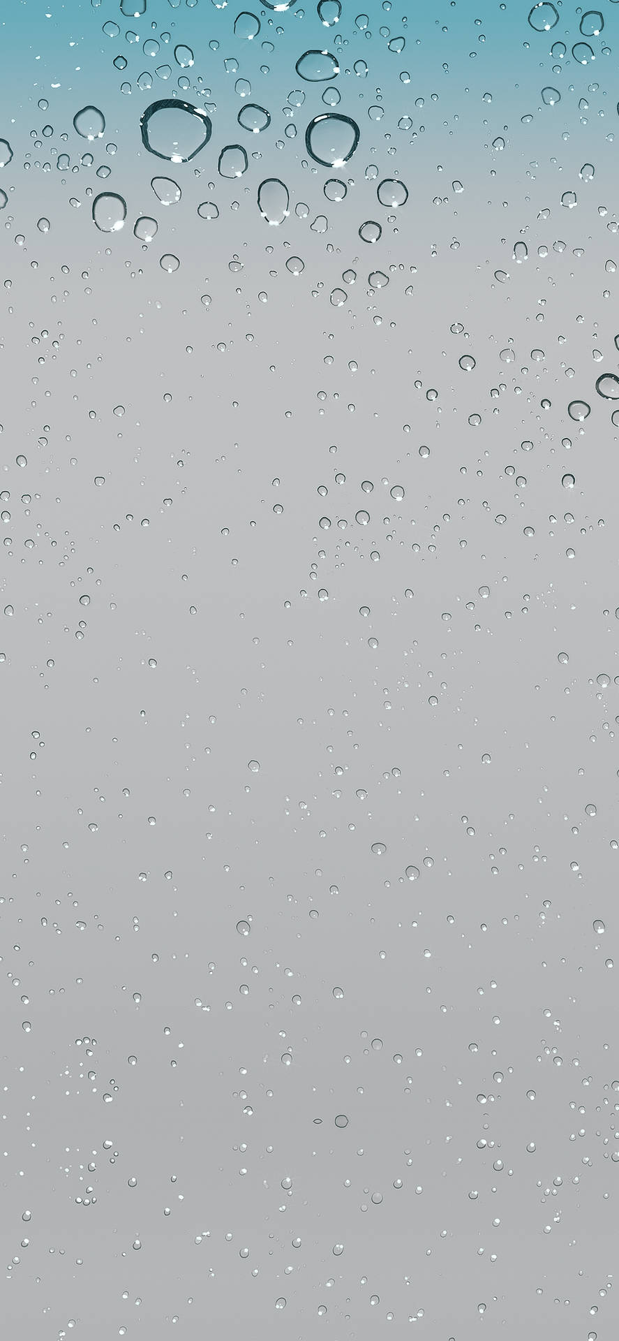 窗戶上的雨滴，背景為藍色到灰色的漸變。