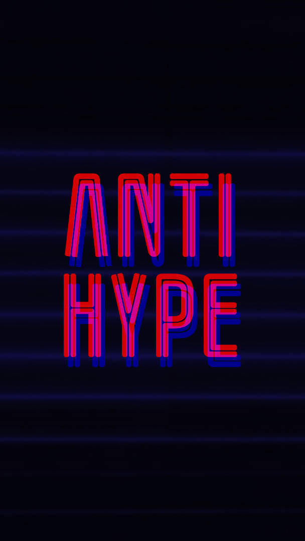 在黑暗背景上帶有紅色和藍色光芒的「anti hype」霓虹燈標誌。