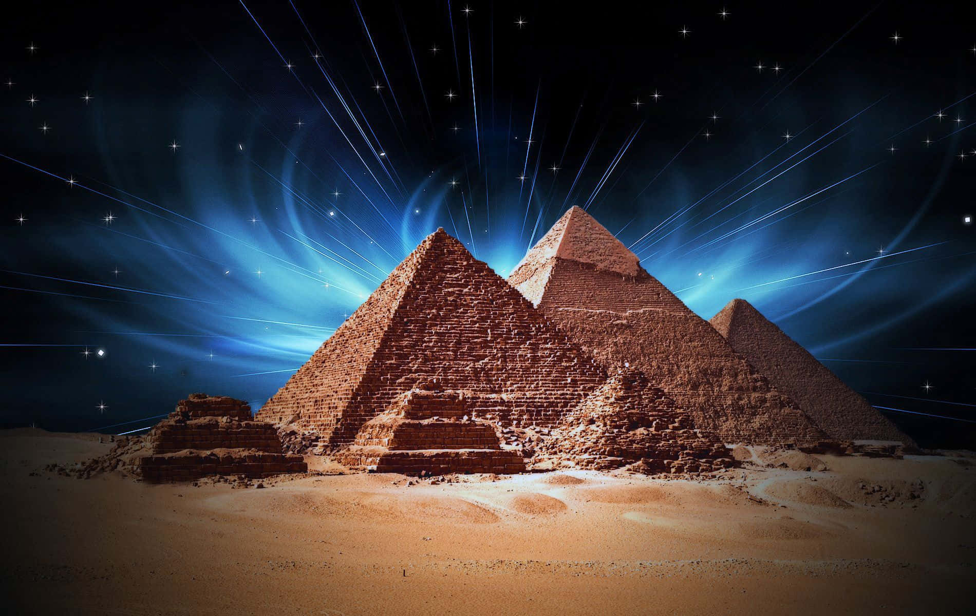 Egypt 桌布 壁紙 — 古老金字塔從沙漠沙地中升起，在充滿活力的藍色星空下，伴隨著耀眼的光束。