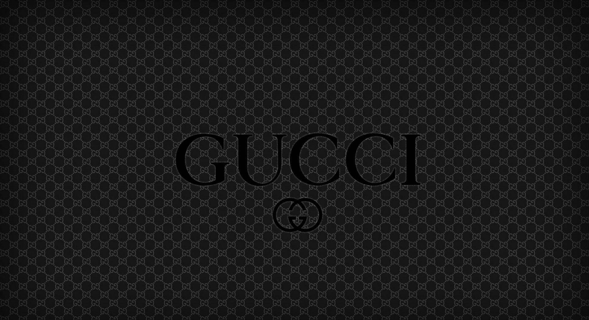 深色字母組合背景上的Gucci標誌