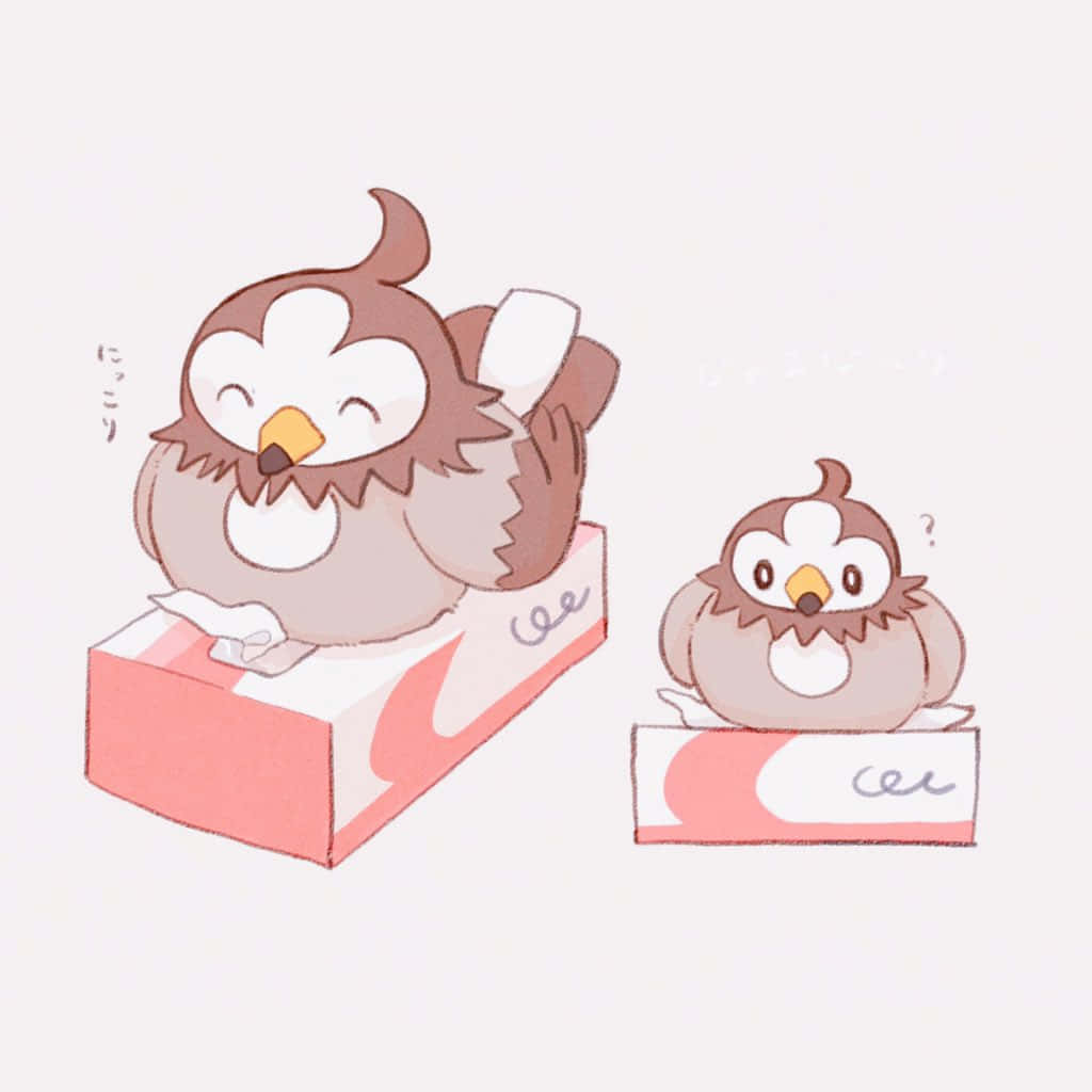 可愛 Starly 在紙巾盒上 壁紙 — 兩隻可愛的卡通貓頭鷹，一隻開心地用紙巾擦鼻子，另一隻在空紙巾盒旁邊顯得很困惑。