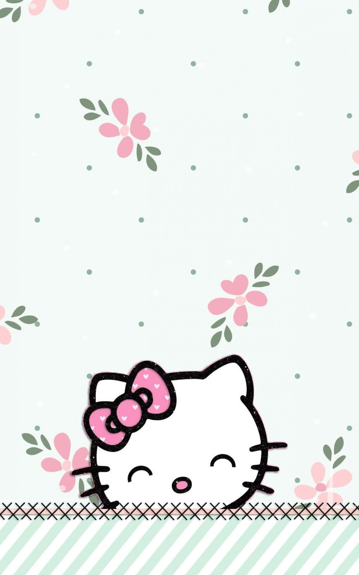 Hello Kitty 喺有粉紅色花同綠色點點嘅條紋邊框上面探頭望出嚟。