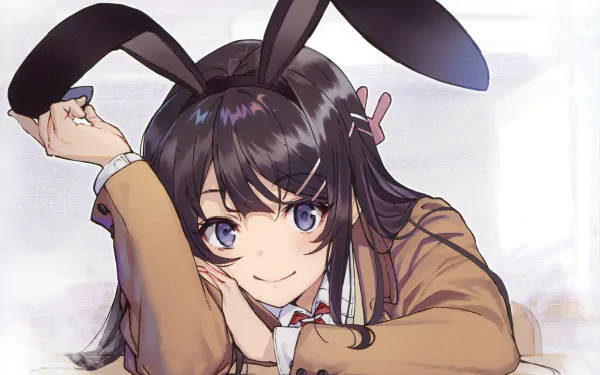 動漫女孩戴著兔耳托腮微笑。