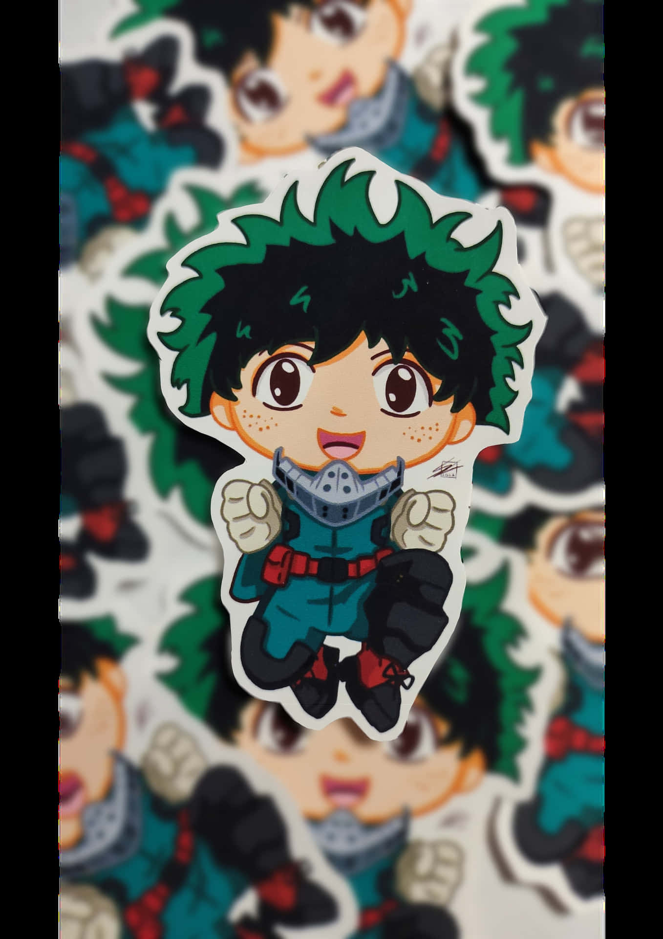 綠色頭髮同藍色衫嘅chibi動漫英雄貼紙，握緊拳頭