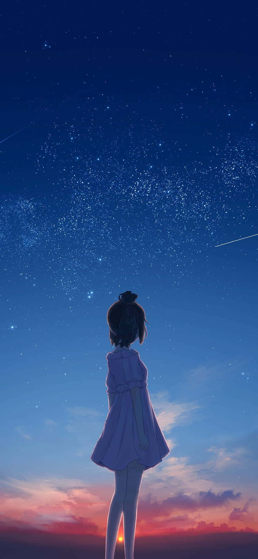 一個穿著紫色連衣裙的女孩站著仰望星光燦爛的黃昏天空，有粉紅色和橙色的雲彩。
