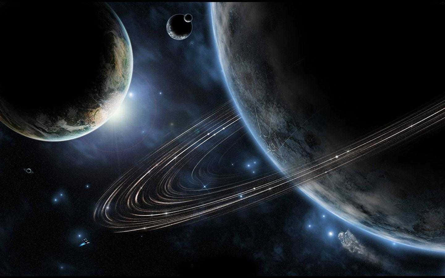 兩個帶有光環和星星的行星在浩瀚的太空之中。