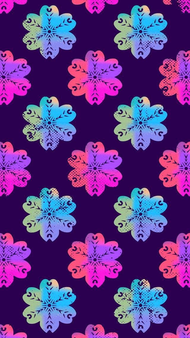 深紫色背景上的霓虹雪花圖案