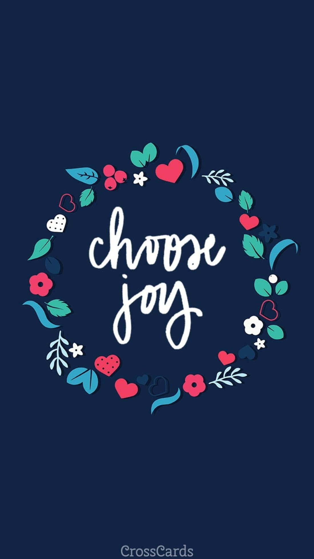 可愛快樂花環 壁紙 — 深藍色牆紙上，白色草書字體寫著「choose joy」，周圍環繞著色彩繽紛的心形、花朵和葉子花環。