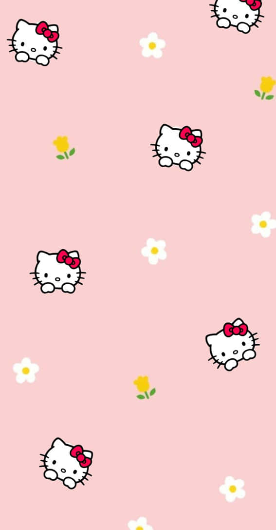 Kawaii Hello Kitty 桌布 壁紙 — 可愛的Hello Kitty角色從柔和的粉紅色背景中探出頭來，背景點綴著白色和黃色的花朵。