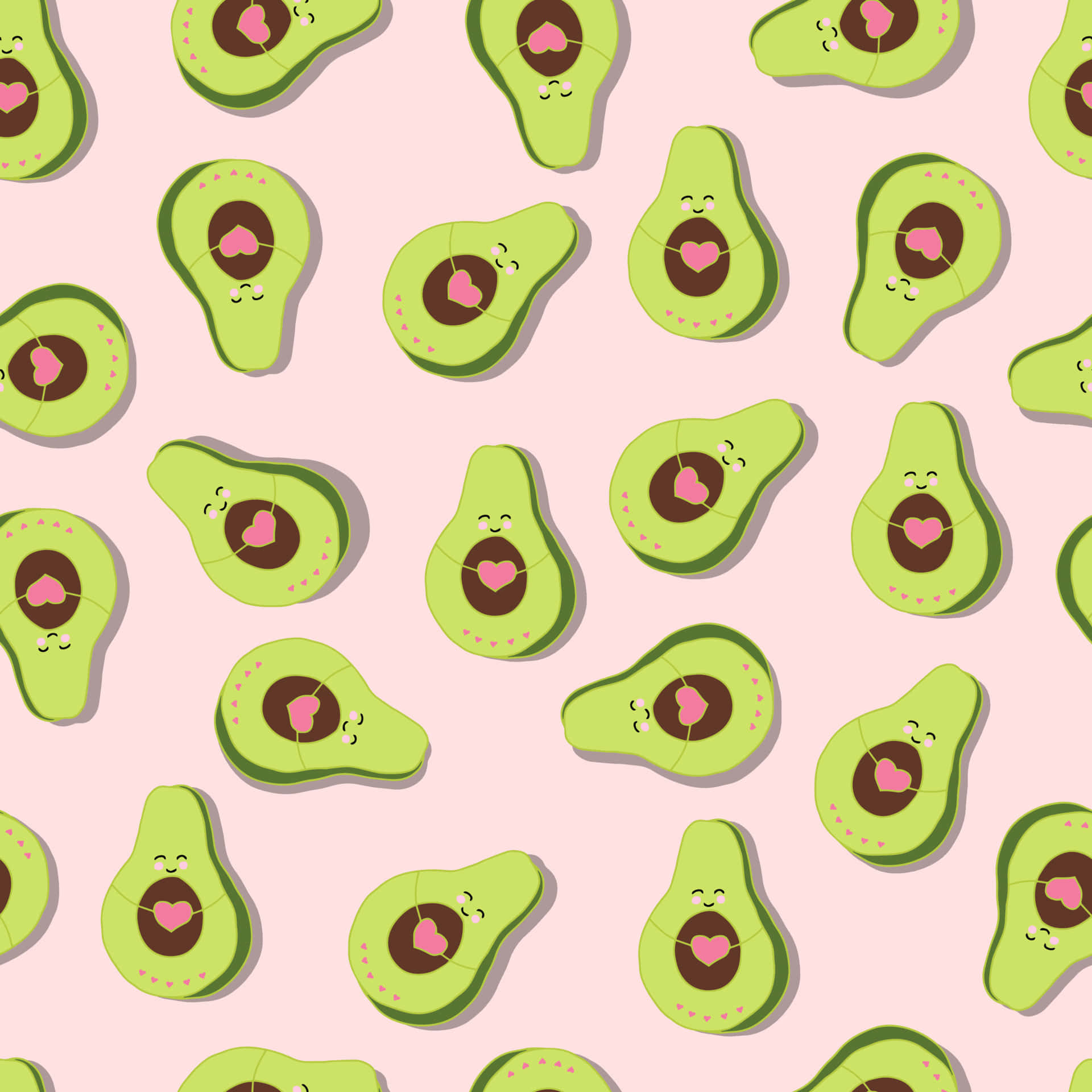 Cute Avocado 桌布 壁紙 — 可愛的牛油果切片，帶有笑臉和粉紅心形，在柔和的粉紅背景上重複。