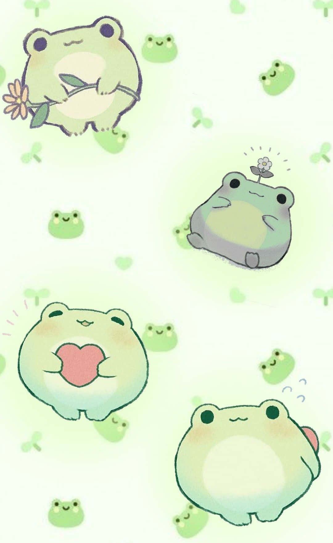 Cute Frog 桌布 壁紙 — 可愛的粉綠色青蛙帶著可愛的表情，在柔和的漸變背景上拿著花朵和心形。