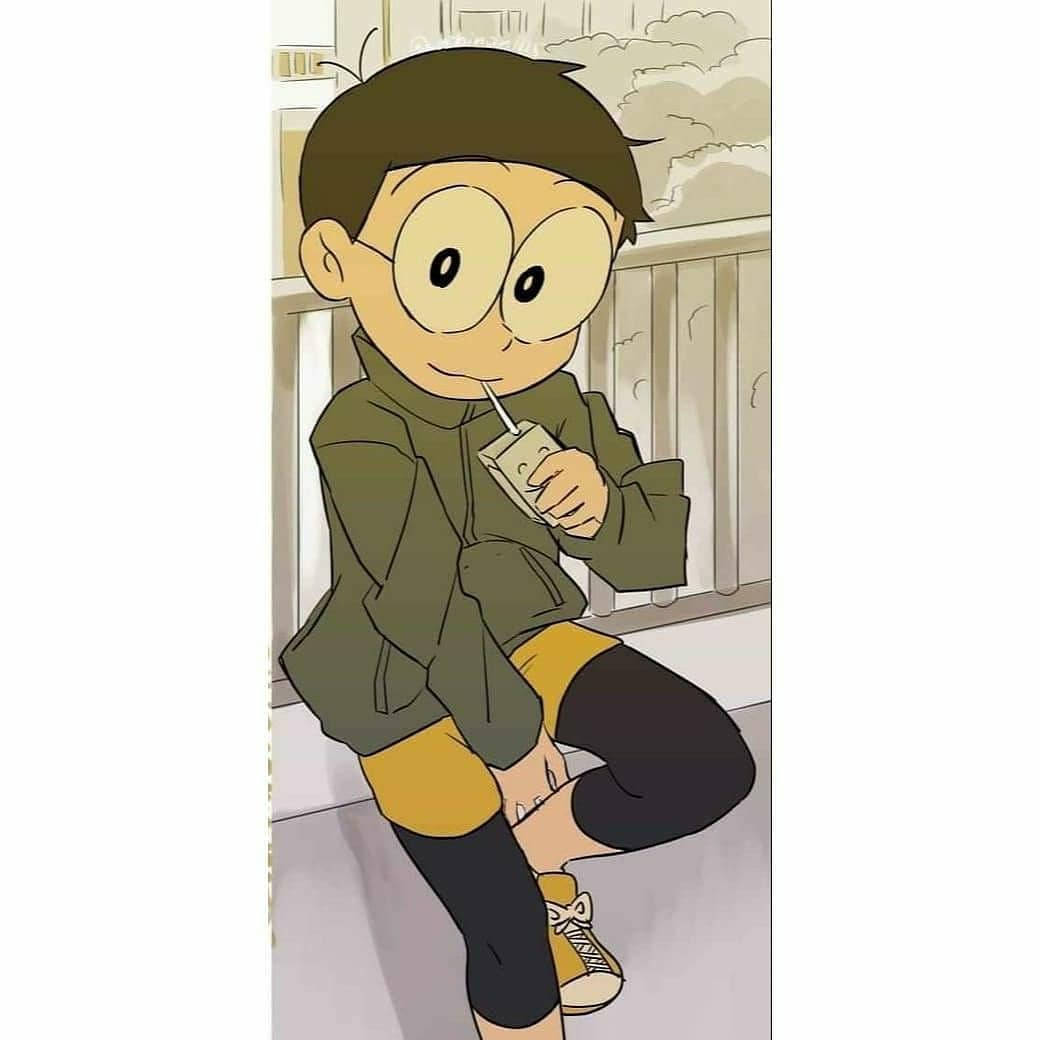 動漫男孩穿綠色外套在陽台喝果汁
