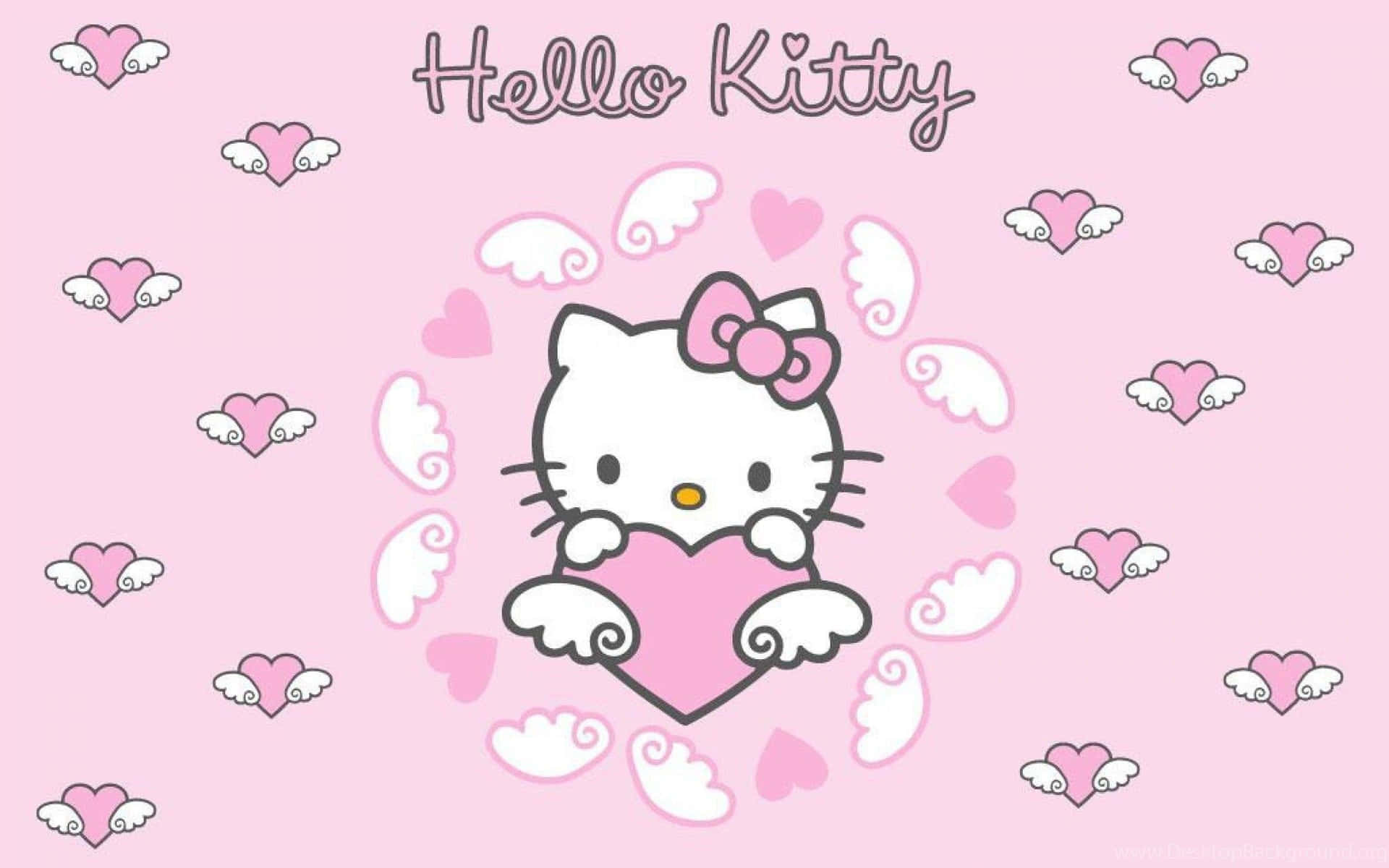 可愛粉紅 Hello Kitty 拥抱有翼心形 壁紙 — Hello Kitty 帶着天使翅膀，在柔和的粉紅色背景上，手持一個被漂浮的心形和翅膀包圍的粉紅色心形。