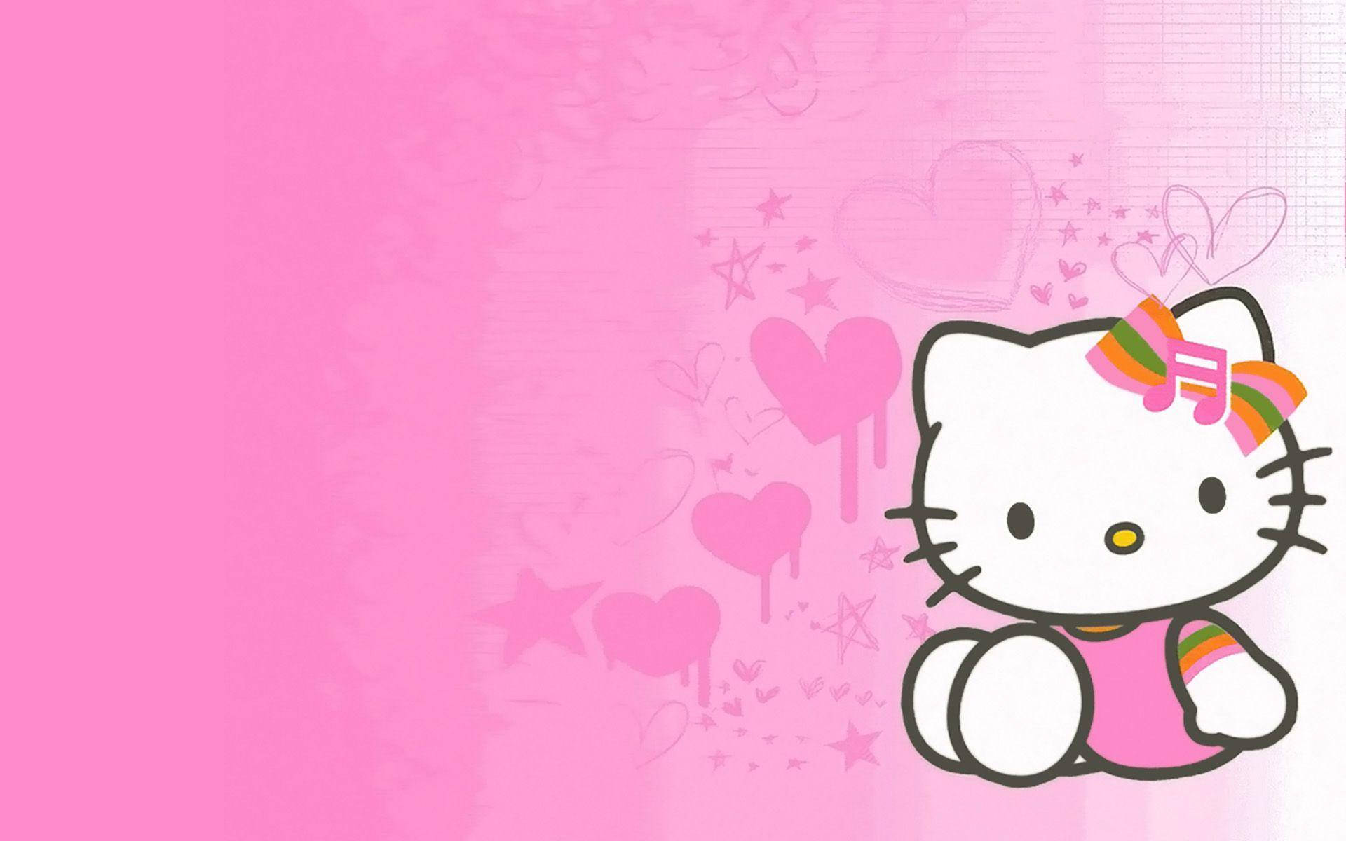 可愛粉紅 Hello Kitty 桌面 壁紙 — Hello Kitty 愉快地坐在一個以心形和星星裝飾的柔和粉紅色背景上。