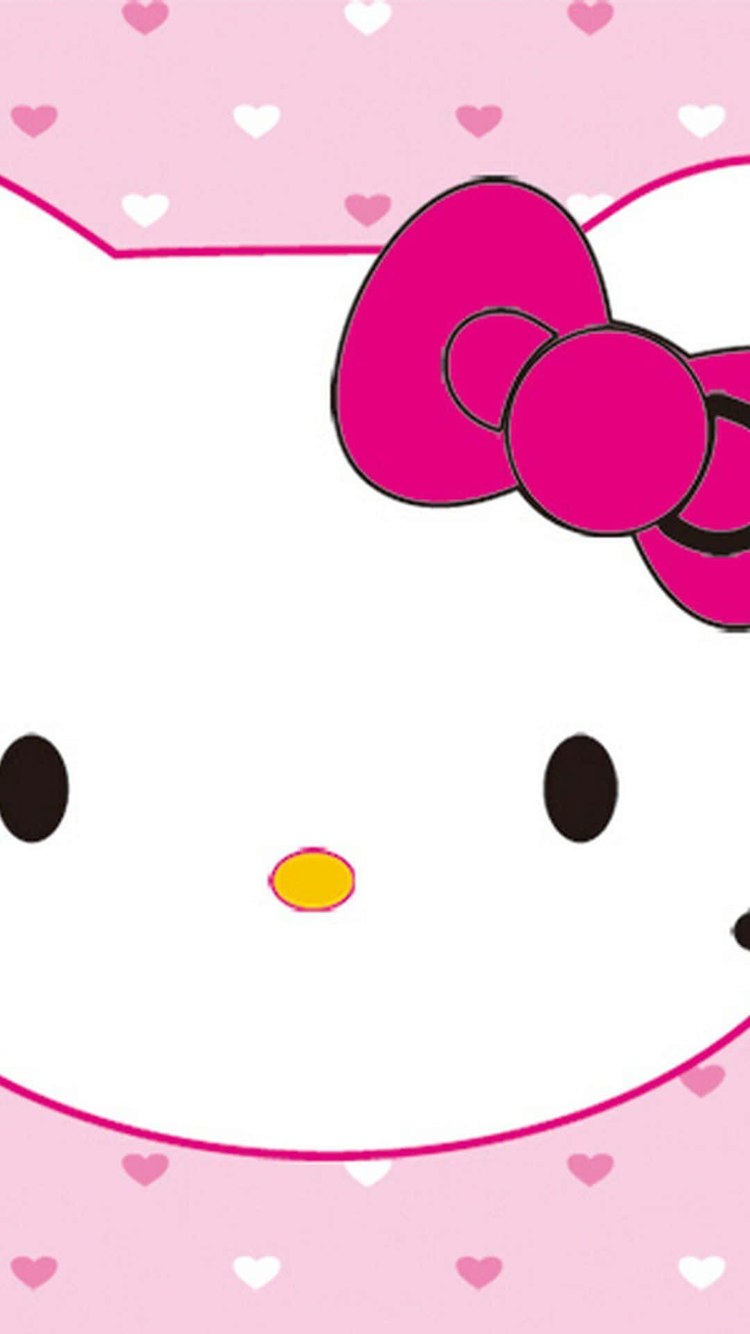 可愛粉紅Hello Kitty近照 壁紙 — Hello Kitty 臉部特寫，戴著一個大粉紅色蝴蝶結，背景為粉紅色並散落著心形圖案。