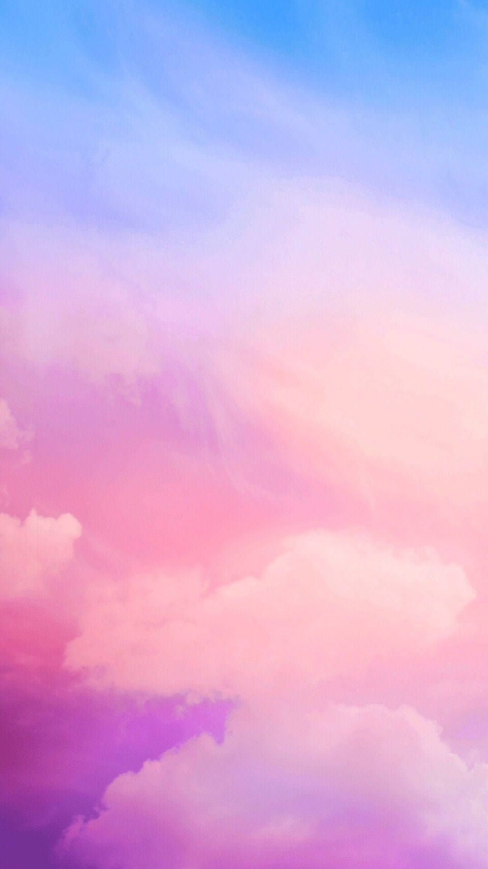 寧靜天空中的粉彩粉紅、紫和藍色雲朵