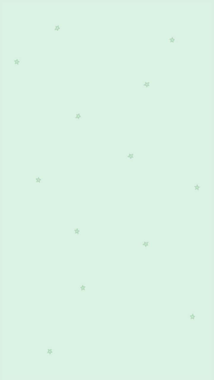 可愛粉綠色小圓點圖案 壁紙 — 柔和的薄荷綠色背景，散落著細小的星星形狀，營造出溫柔的天體圖案。