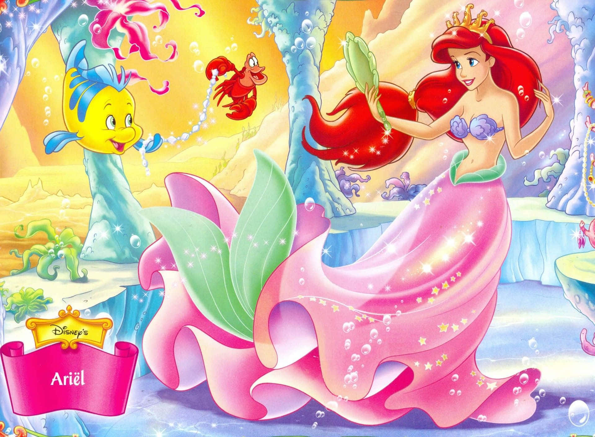 人魚公主艾莉爾在色彩繽紛的水底場景中與朋友們拿著貝殼鏡子。
