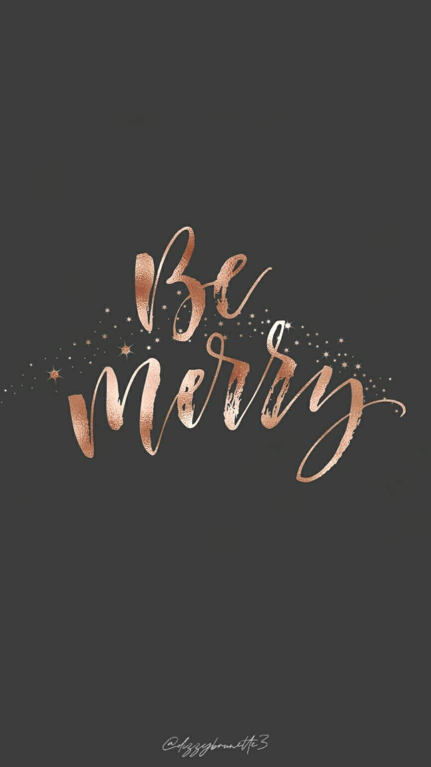 深灰色背景上帶星星的玫瑰金色「Be Merry」文字