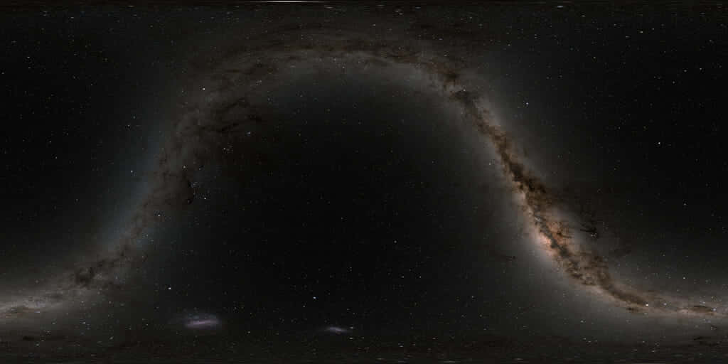 銀河系橫跨繁星點點的夜空，帶有宇宙塵埃和發光星雲。