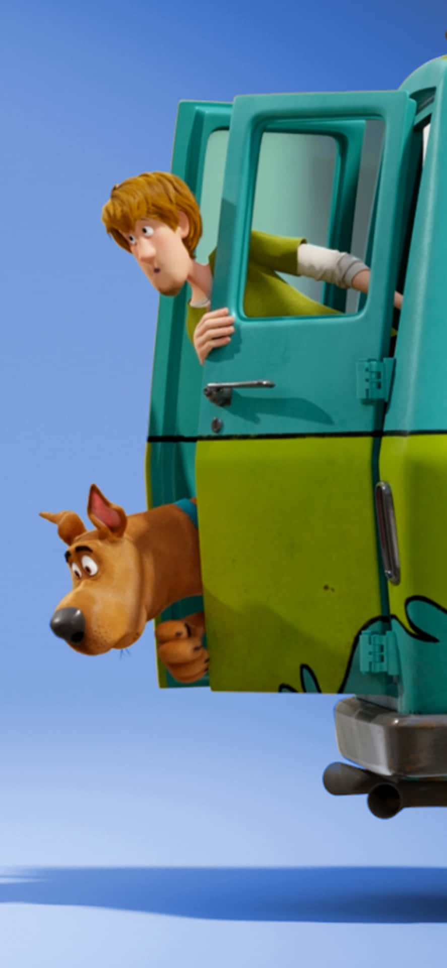 Shaggy 和 Scooby Doo 在 Mystery Machine 貨車內，背景是藍天。