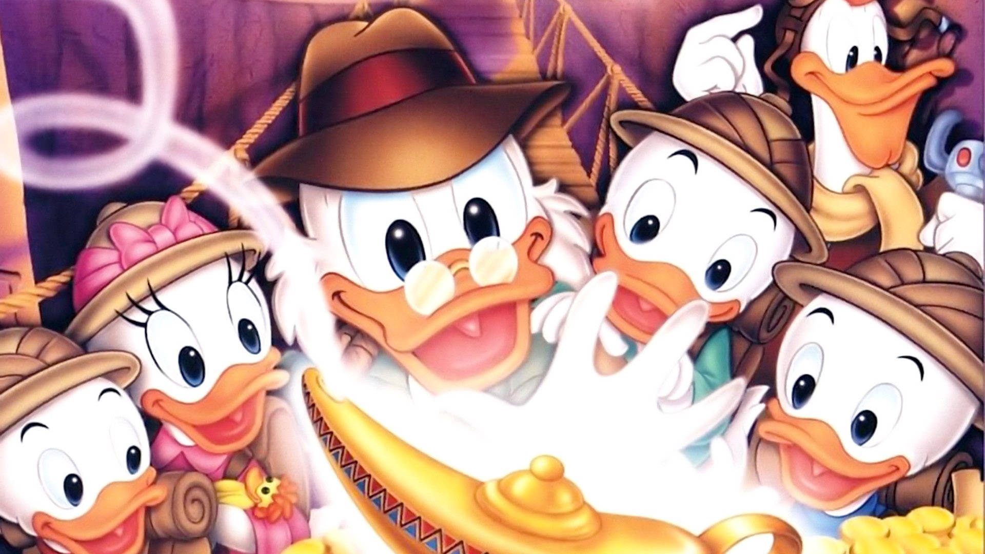 史高治麥克鄧克與孩子發現金燈 壁紙 — DuckTales 嘅探險家帽團隊喺充滿寶藏嘅洞穴入面興奮噉圍住盞發光嘅神燈。