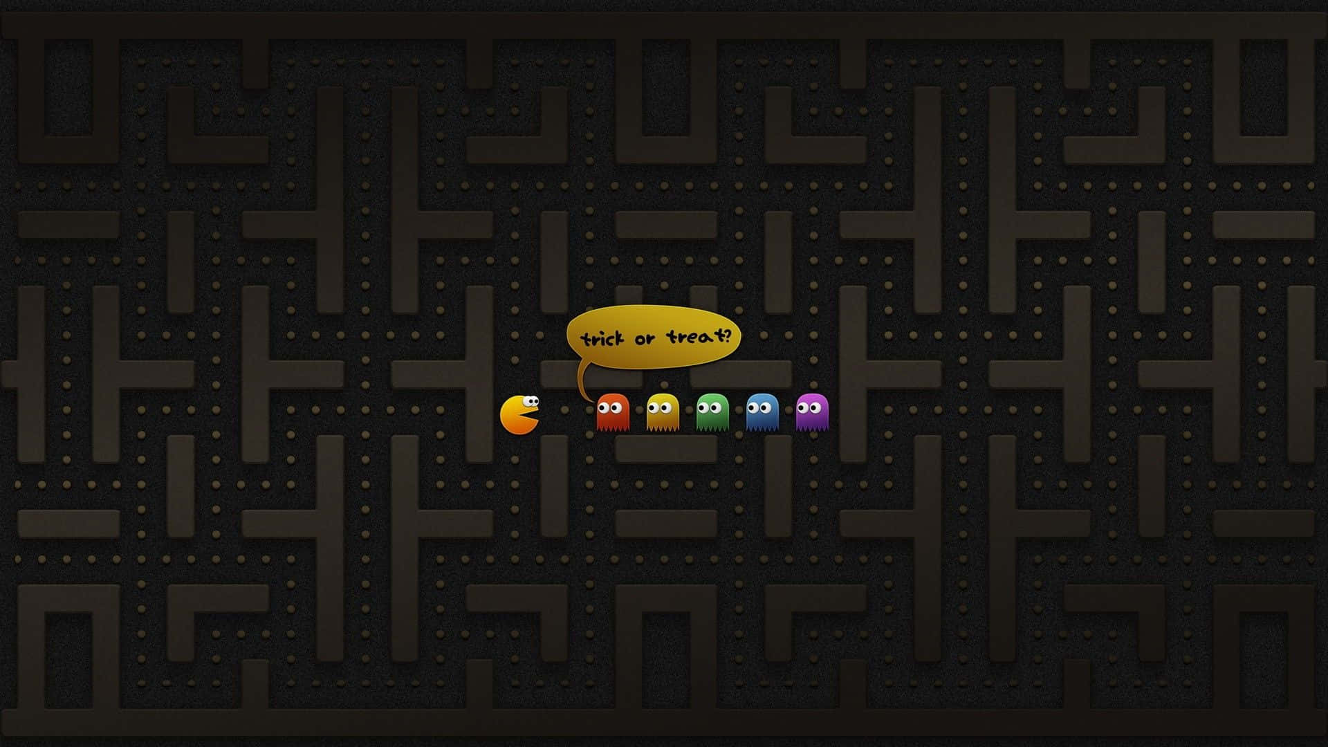 Pac-Man 同四個鬼喺萬聖節主題迷宮入面，有個 trick or treat 對話框。