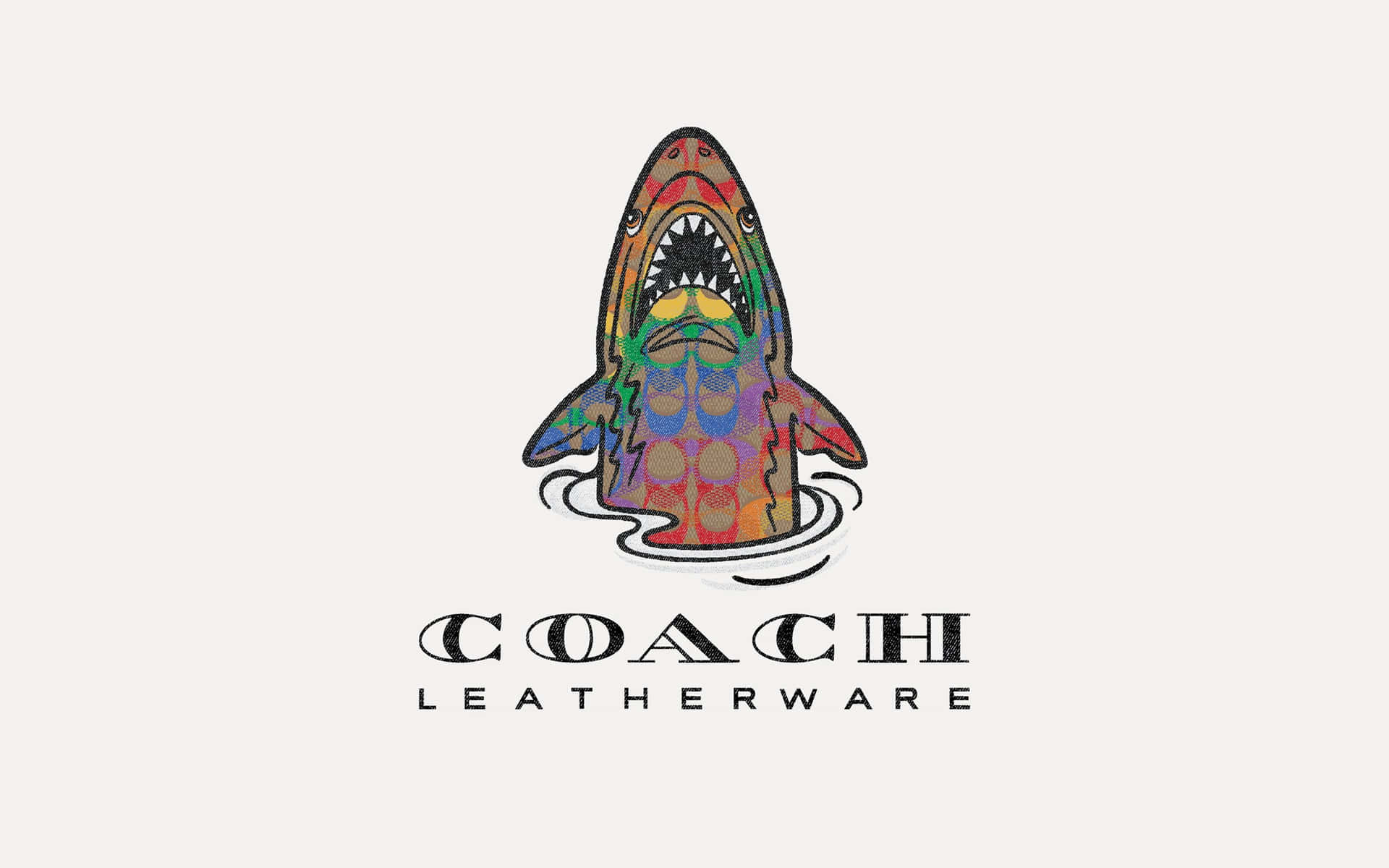 色彩繽紛的鯊魚標誌，下方有 Coach leatherware 文字。