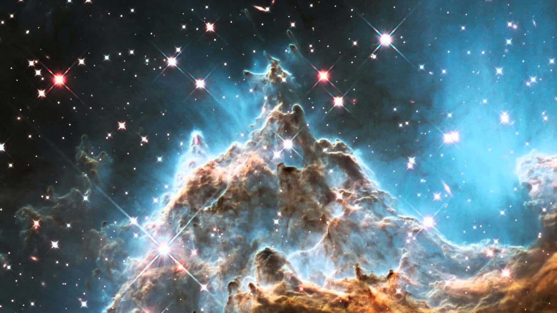 宇宙氣體和塵埃柱，在深空中閃爍著藍色和橙色的恆星。