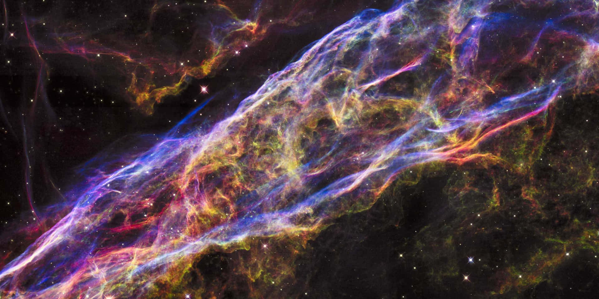 在深空中充滿活力的宇宙星雲，旋轉著氣體和星星。
