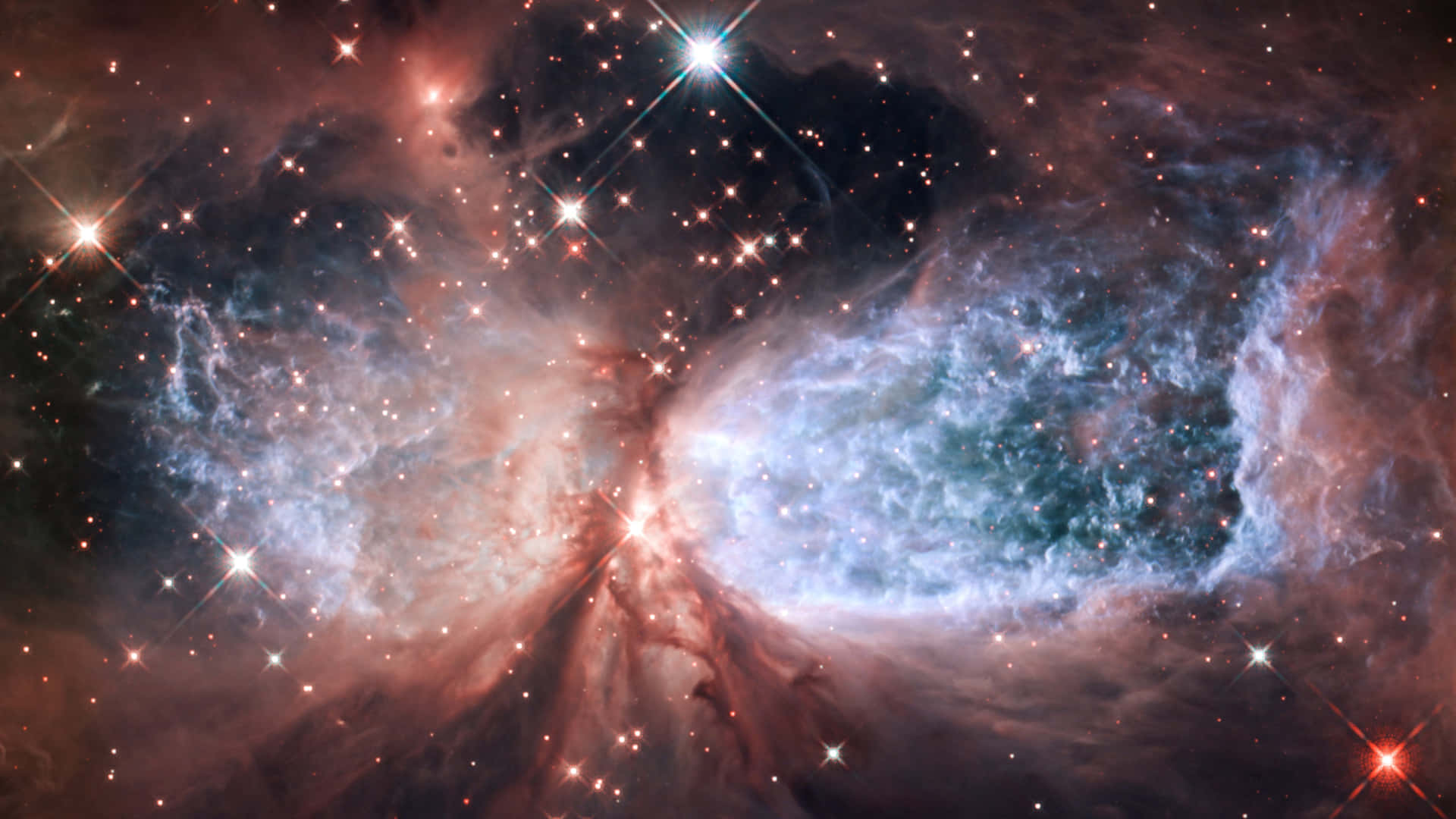 充滿明亮星星和宇宙塵埃雲的彩色星雲。