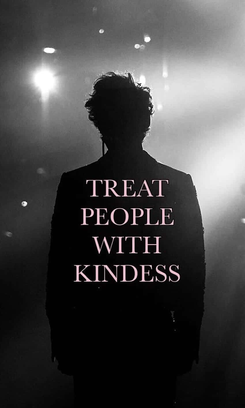 舞台上的人物剪影，附有文字 treat people with kindness。