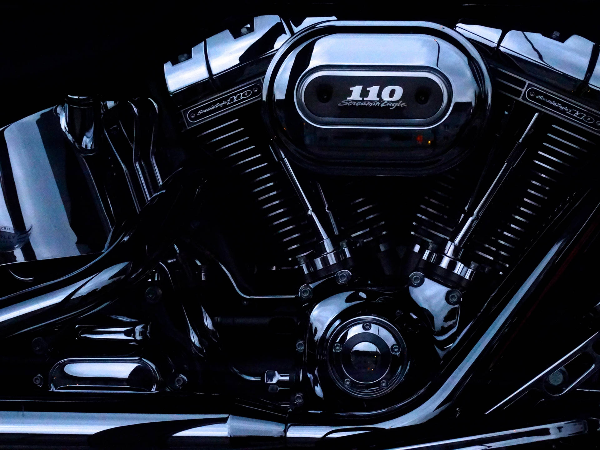 黑色電單車引擎特寫，帶有鍍鉻細節和「110 Screamin' Eagle」品牌標誌。