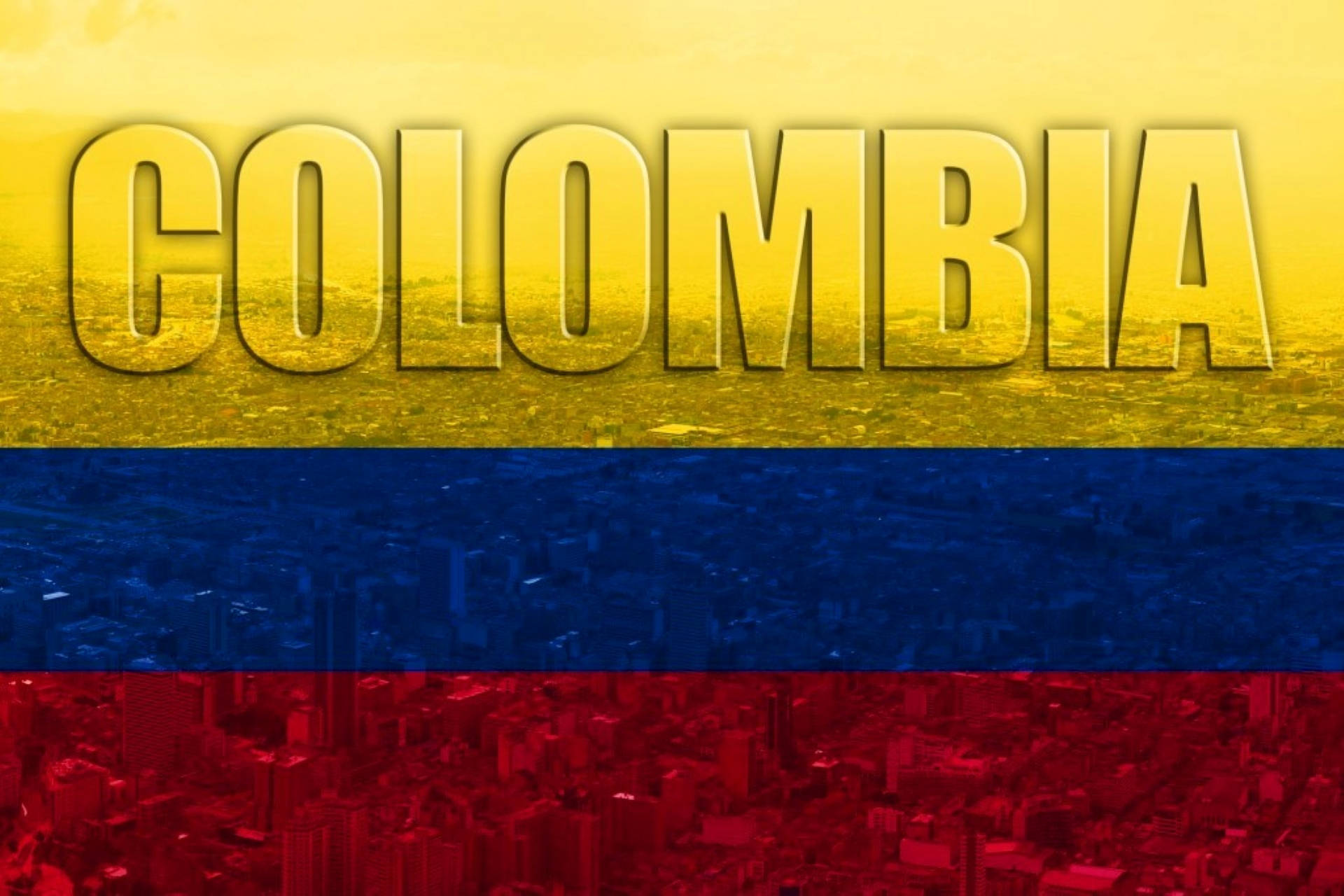 哥倫比亞國旗色調城市風景 壁紙 — 粗體 'COLOMBIA' 文字覆蓋在由國旗黃、藍、紅條紋分割的城市景觀上。