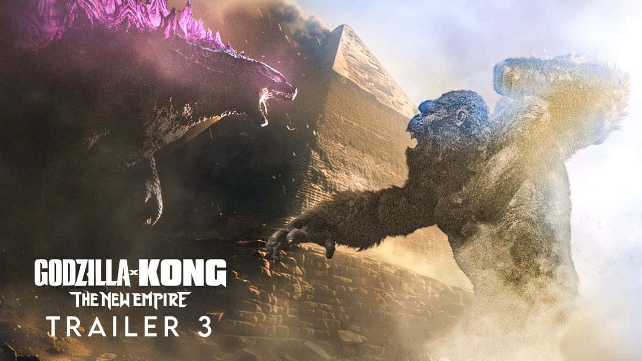 Godzilla X Kong The New Empire 桌布 壁紙 — 哥斯拉發出紫色發光的背鰭，在 crumbling 石頭廢墟中向金剛咆哮。