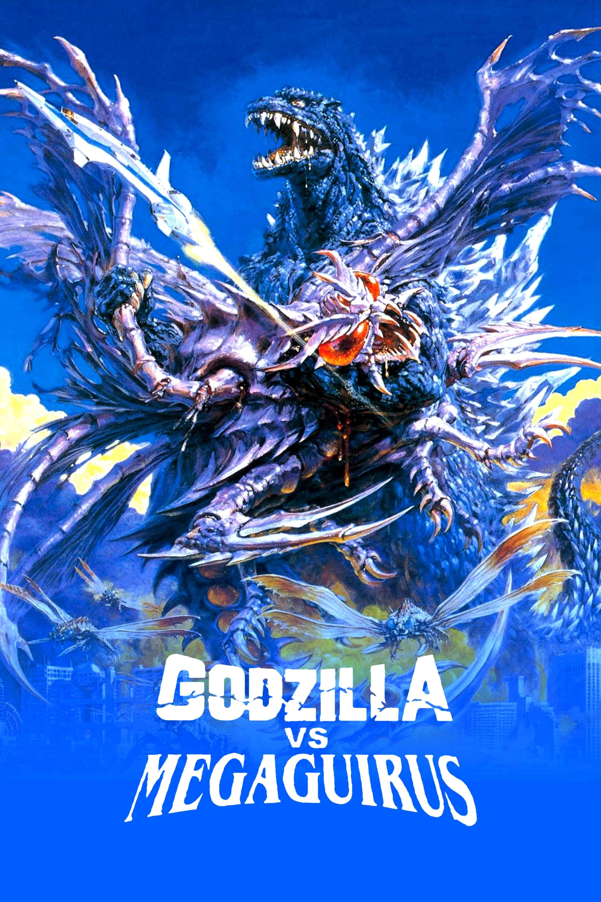 Godzilla Vs Megaguirus 桌布 壁紙 — 哥斯拉與有翼怪獸美加基拉斯戰鬥，背景是鮮豔的藍天，下方是城市廢墟。