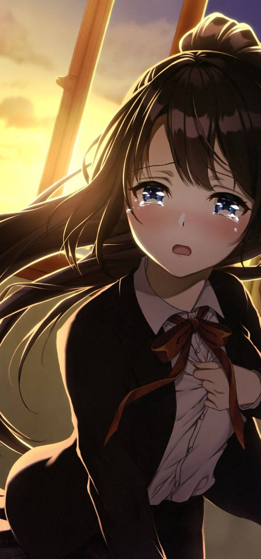 穿校服的動漫女孩在夕陽下哭泣