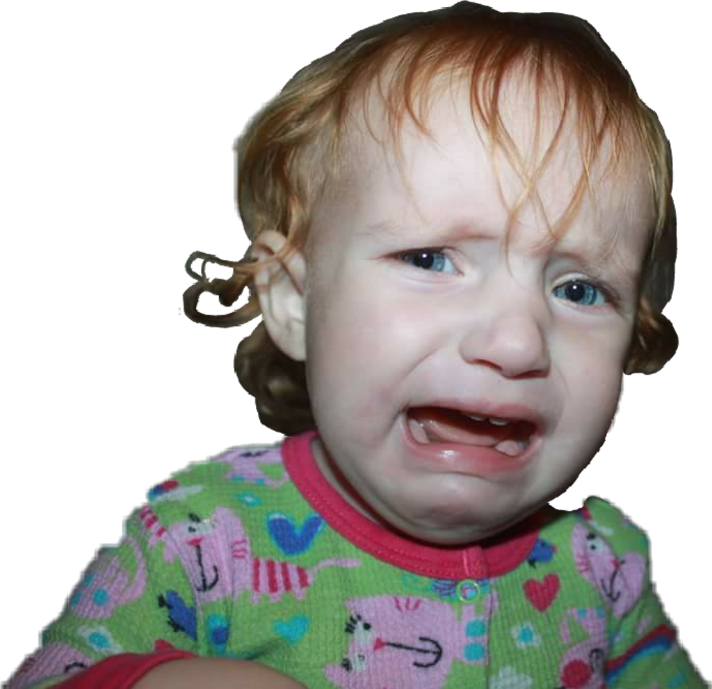 哭泣的幼童 壁紙 — 一個紅髮藍眼、穿著彩色圖案連身衣的幼兒在黑色背景下哭泣的特寫。