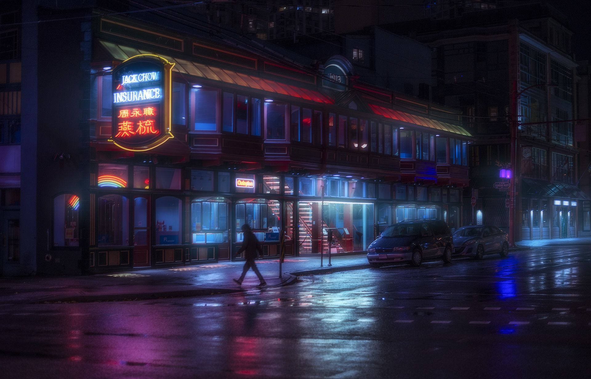 唐人街璀璨夜景 壁紙 — 一個孤獨的身影在夜晚走過被雨水浸濕的城市街道，被映照在濕漉漉路面上的鮮豔霓虹招牌照亮。