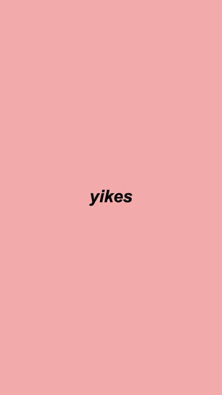 粉紅色背景，黑色文字顯示「yikes」。