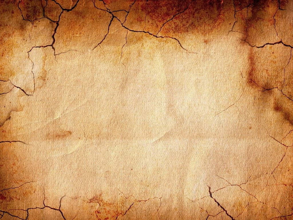 裂開的復古羊皮紙，帶有棕色污漬和紋理表面。