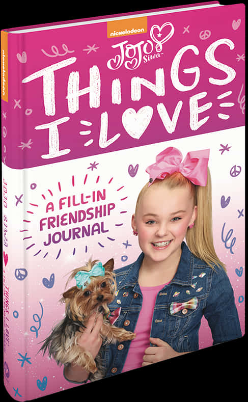 喬喬·希瓦《我愛的事物》日記封面 壁紙 — Jojo Siwa 燦爛地微笑，抱著一隻戴著藍色蝴蝶結的約克夏㹴，背景是粉紅色，充滿了心形和和平標誌。