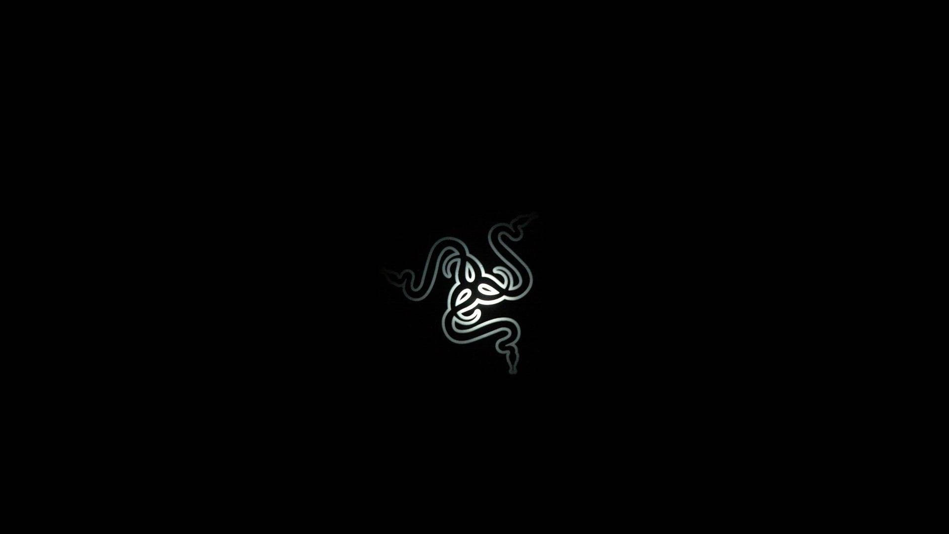 單色 Razer PC 標誌 壁紙 — 一個極簡風格的白色線條繪畫，三頭蛇標誌居中於純黑色背景上。