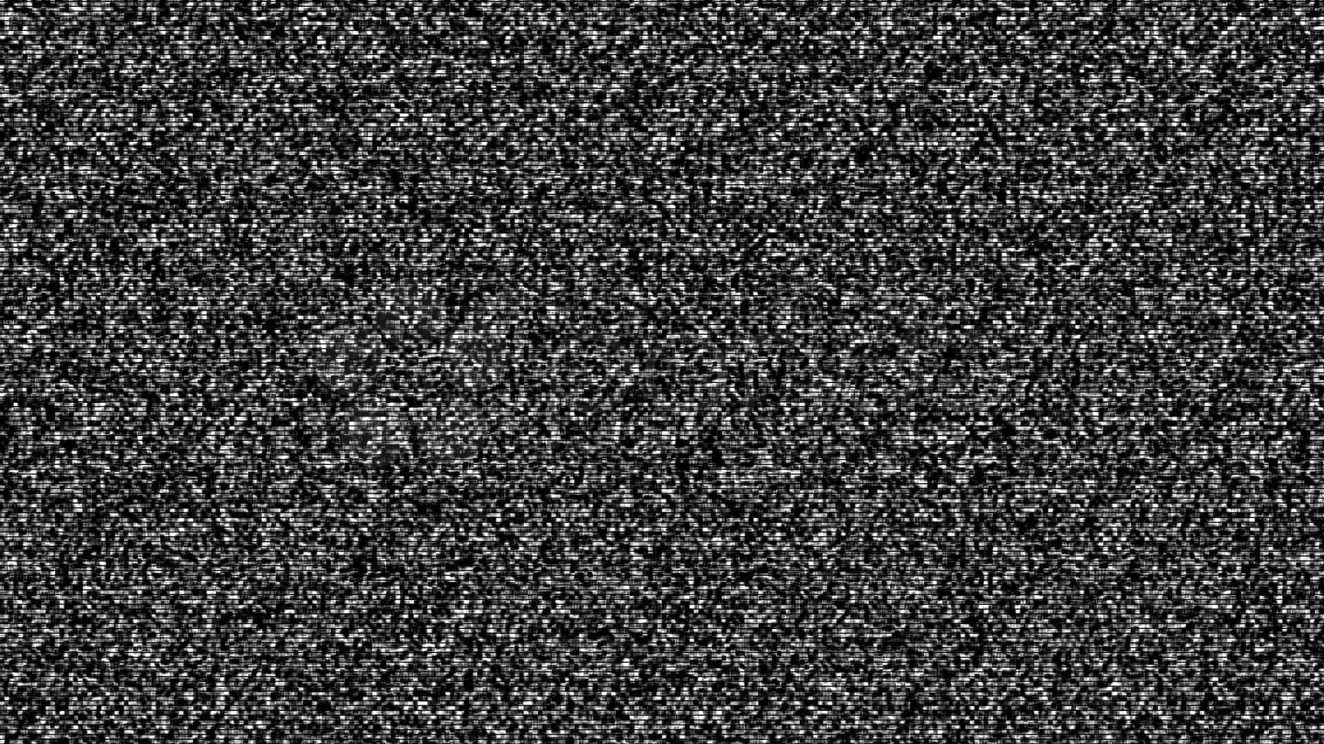 靜態gif 桌布 壁紙 — 單色靜態噪聲圖案充滿屏幕，帶有顆粒狀斑點和閃爍像素。