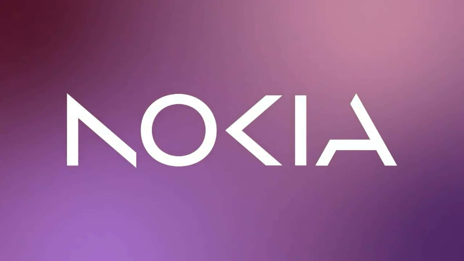 Nokia 桌布 壁紙 — 單詞 nokia 以粗體白色字母居中顯示在漸變紫色背景上。