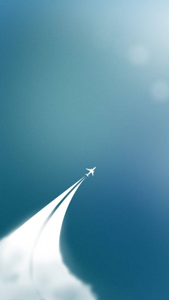 噴氣式飛機簡約手機背景 壁紙 — 一架孤獨的飛機在帶有柔和鏡頭光暈的漸變藍色天空中留下一條明亮的白色凝結尾跡。