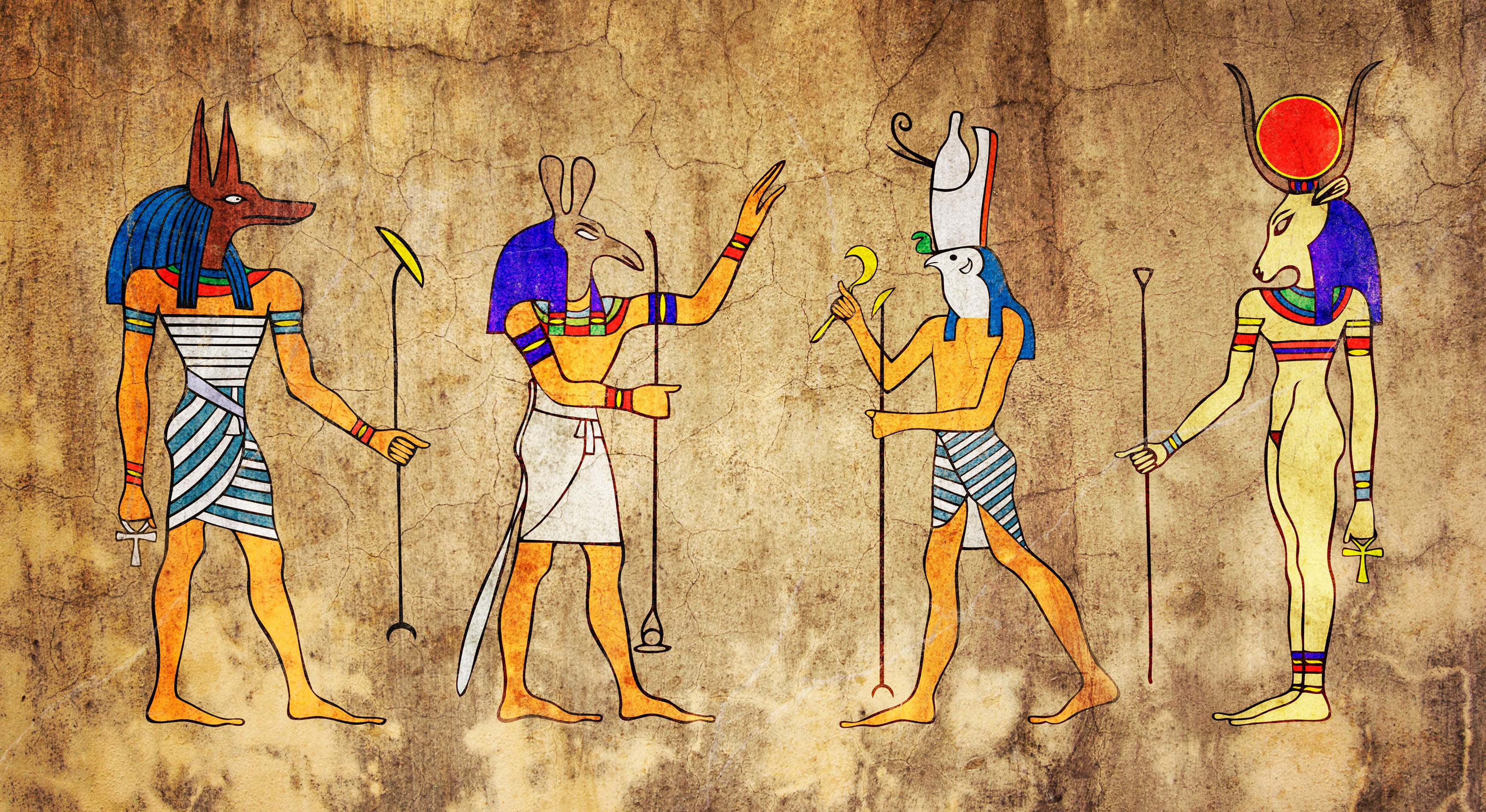 Egyptian Gods 桌布 壁紙 — 四位古埃及神祇以鮮明的象形文字風格繪製在龜裂的羊皮紙背景上。