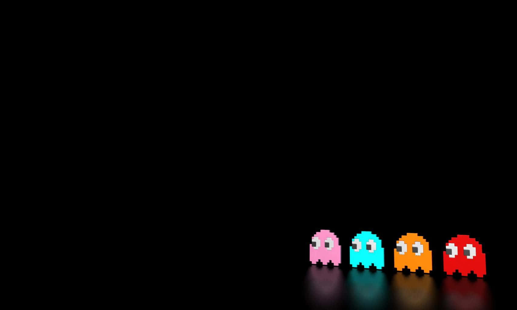 arcade 桌布 壁紙 — 四個來自 Pac-Man 的彩色像素鬼魂排成一排，背景為黑色，帶有微妙的反射。